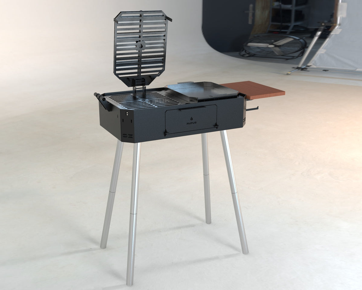 Austral portable grill with the cross grill raised and griddle in place