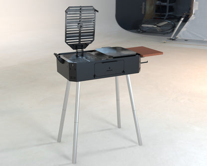 Austral portable grill with the cross grill raised and griddle in place