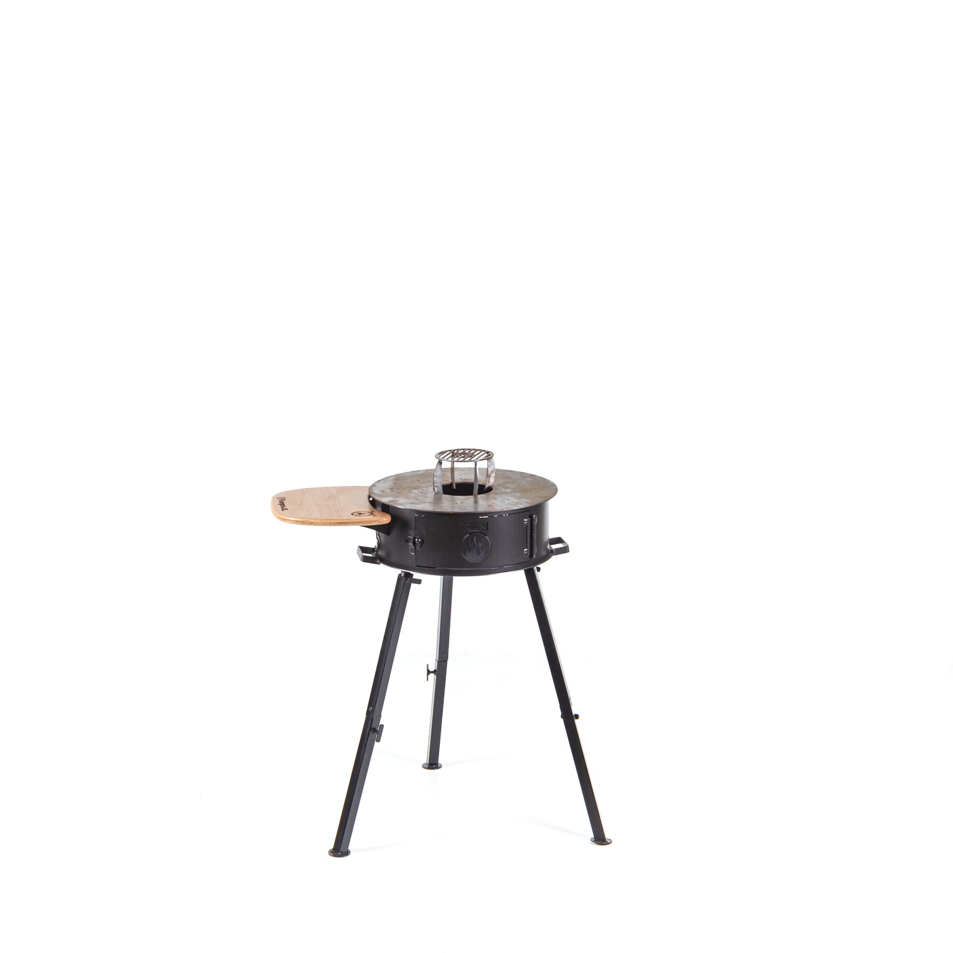 Cowboy portable grill closed, showing the ember basket and wood surface