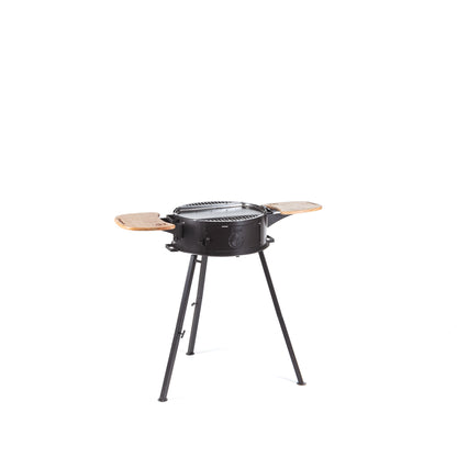 Ivar 2.0 portable grill with the cooking grate in place and the dual wood surfaces
