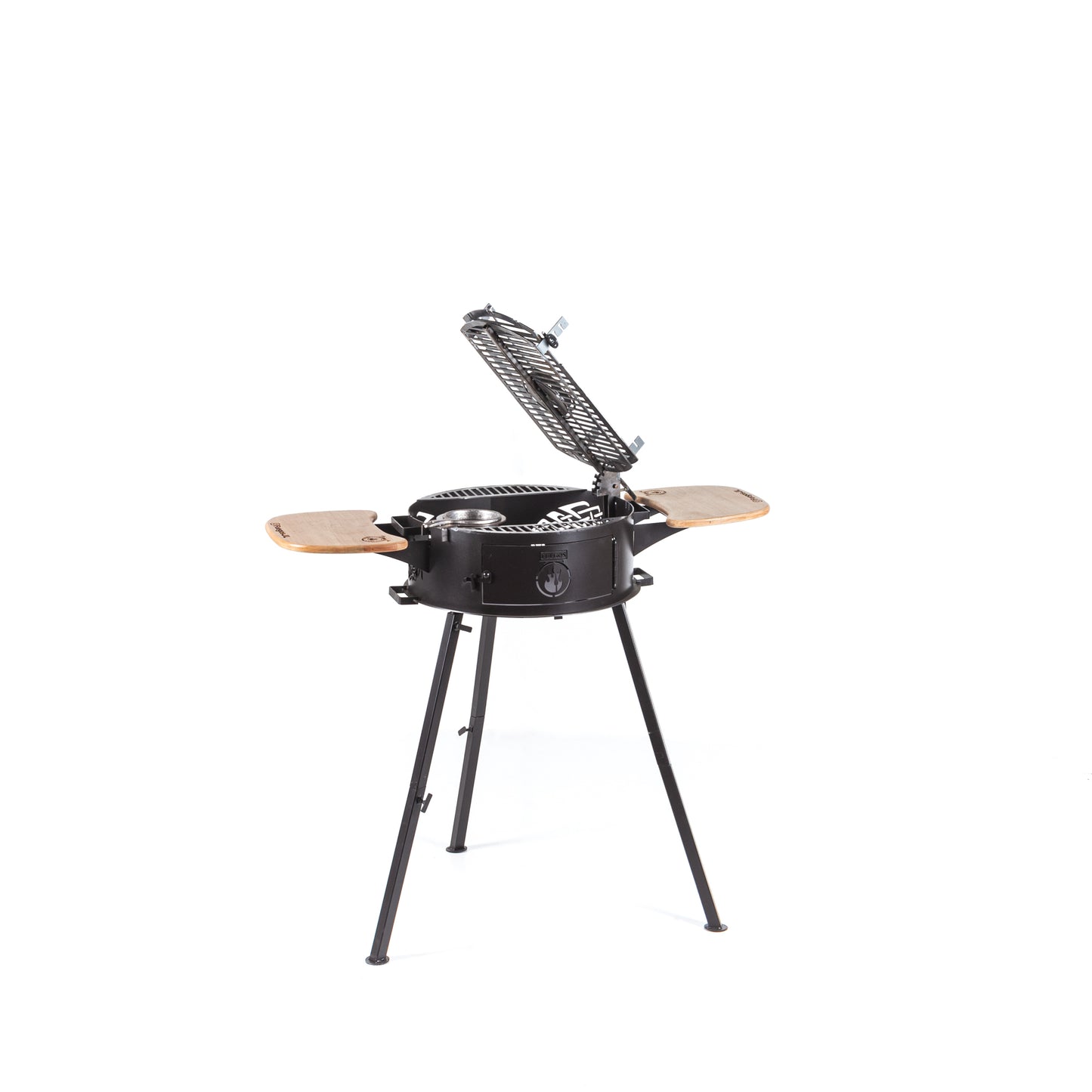 Ivar 2.0 portable grill with the cross grill raised over the ember basket
