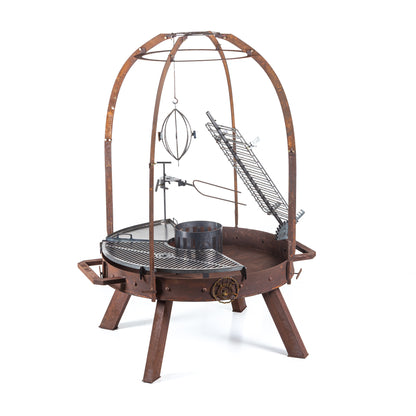 Ram 120 PRO four-leg grill in rust finish with the arch cooking system and rotisserie