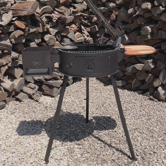 Ivar 2.0 portable grill: the ember box door, the lift-out grate, a cast iron pan and the side ember basket